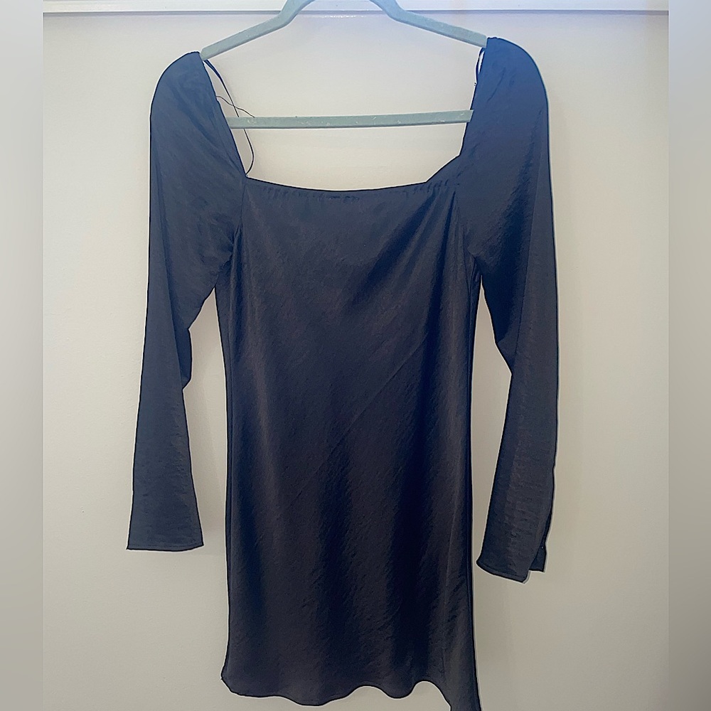 Black, square neck dress from Princess Polly. Silky, loose fitting.
